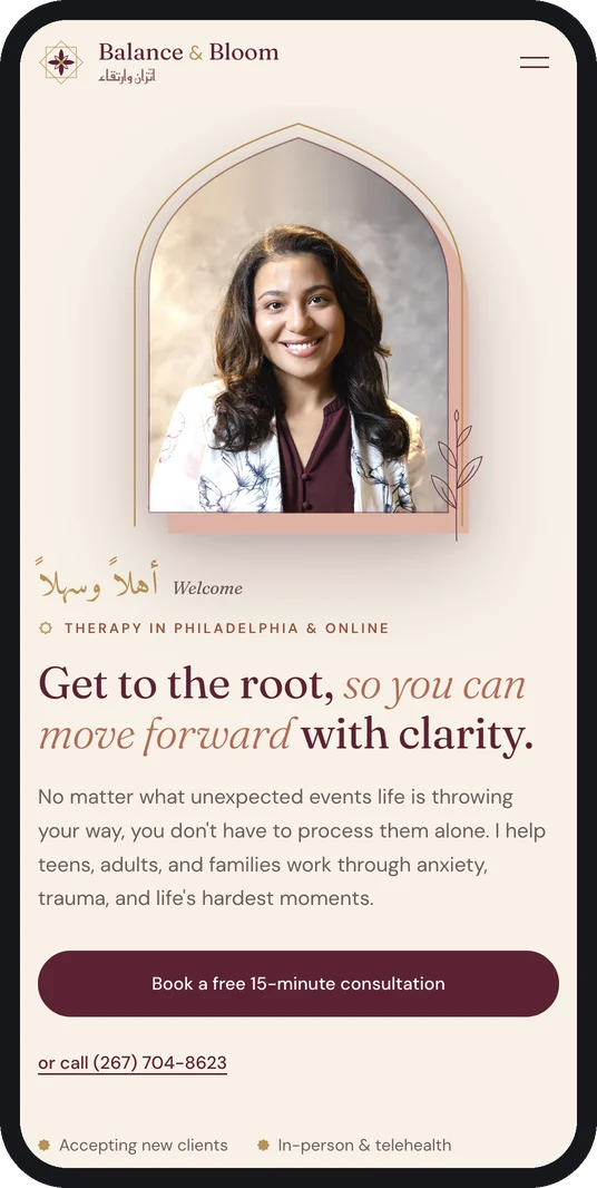 Balance & Bloom home screen on a phone, with a welcome in Arabic and English and a button to book a free consultation